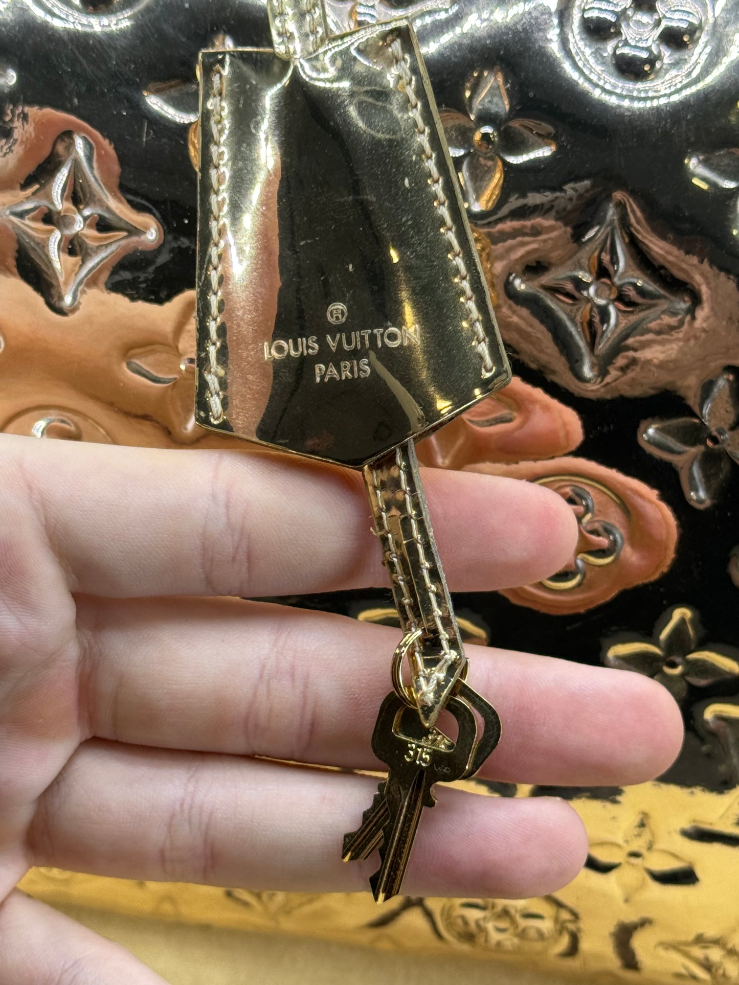 Louis Vuitton speedy 35 mirror gold