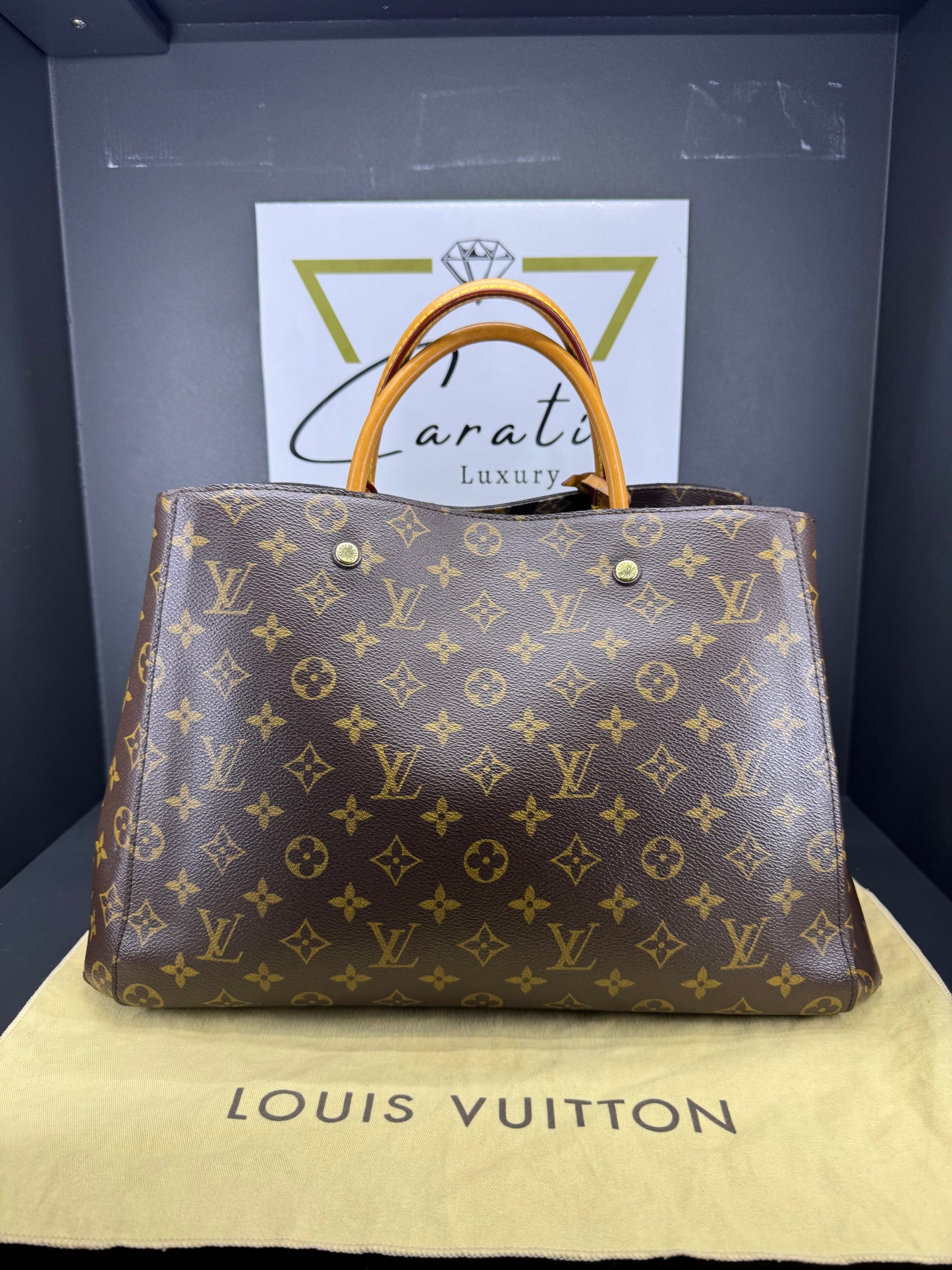 Borsa a mano Louis Vuitton Montaigne MM Monogram