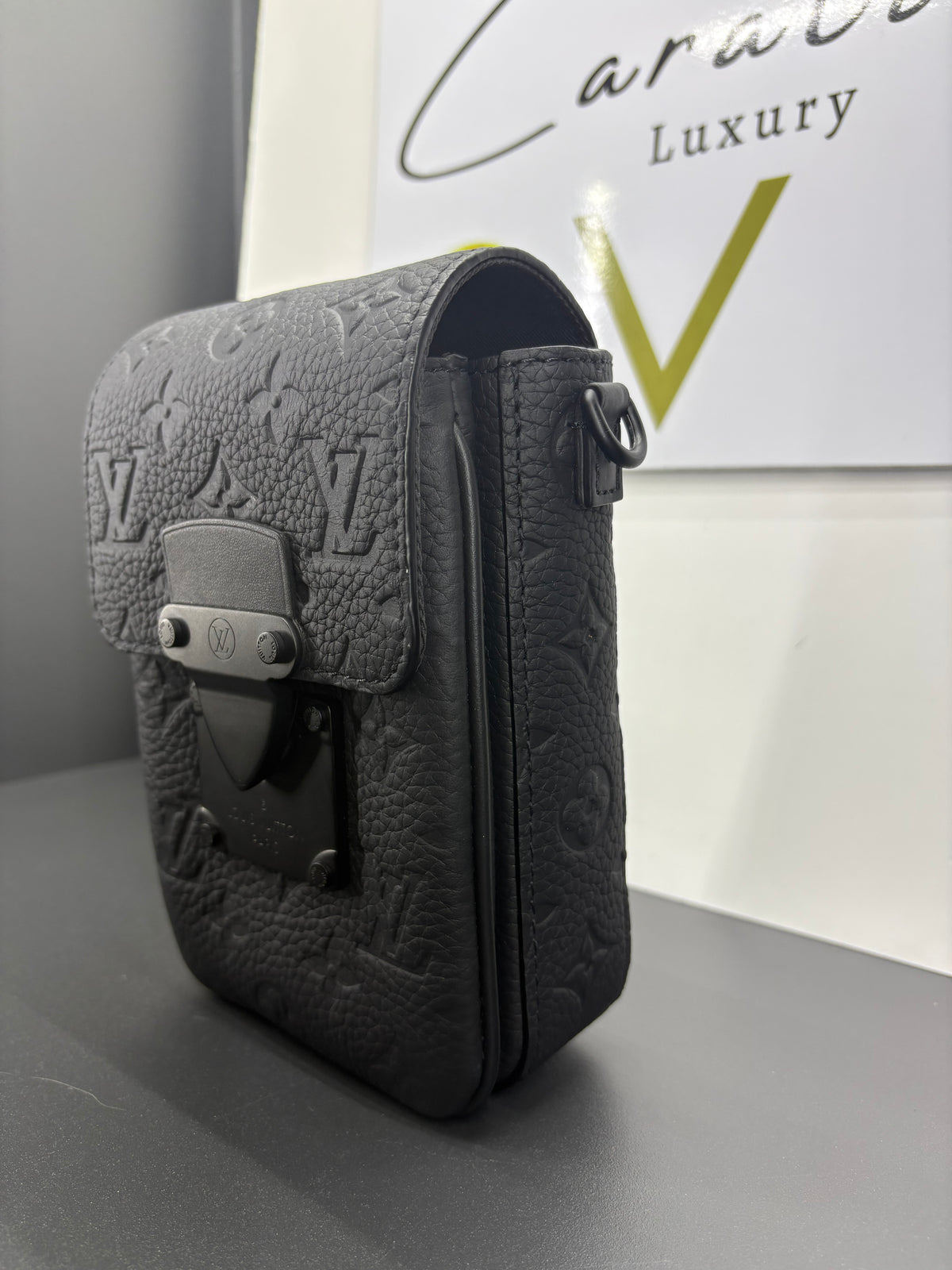 Louis Vuitton Lock Vertical Wearable Wallet