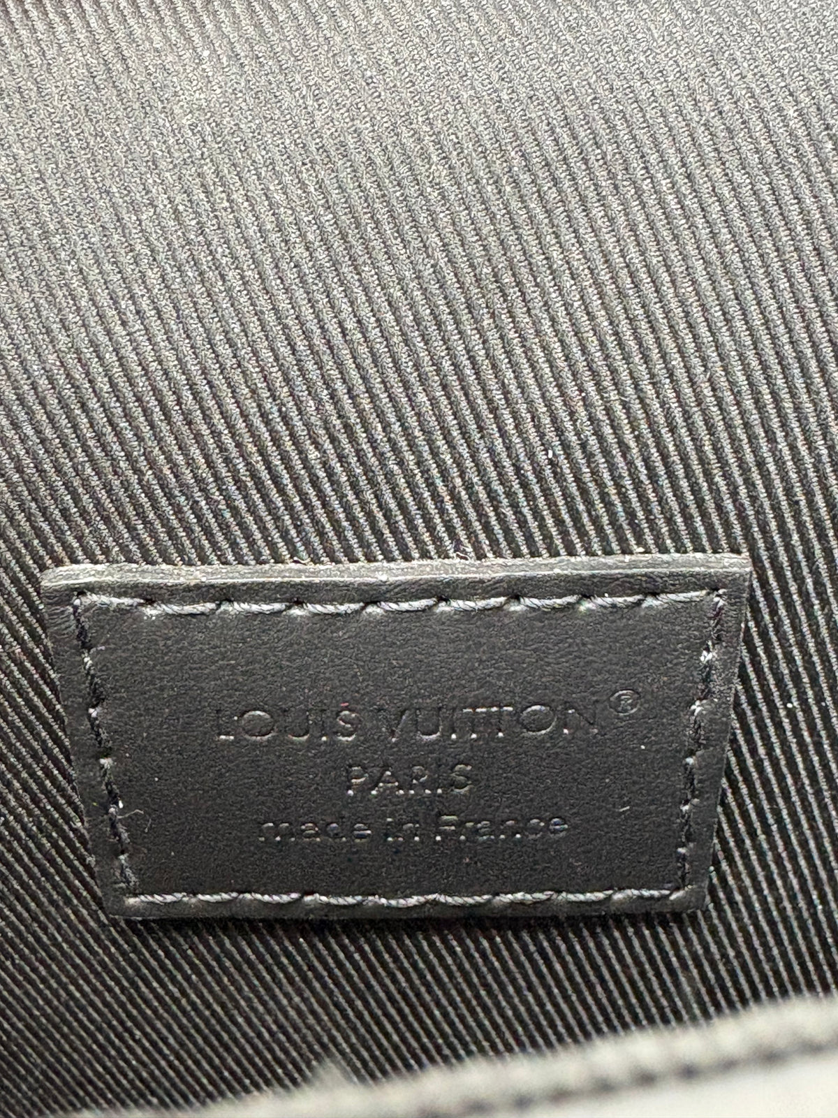 Louis Vuitton Lock Vertical Wearable Wallet