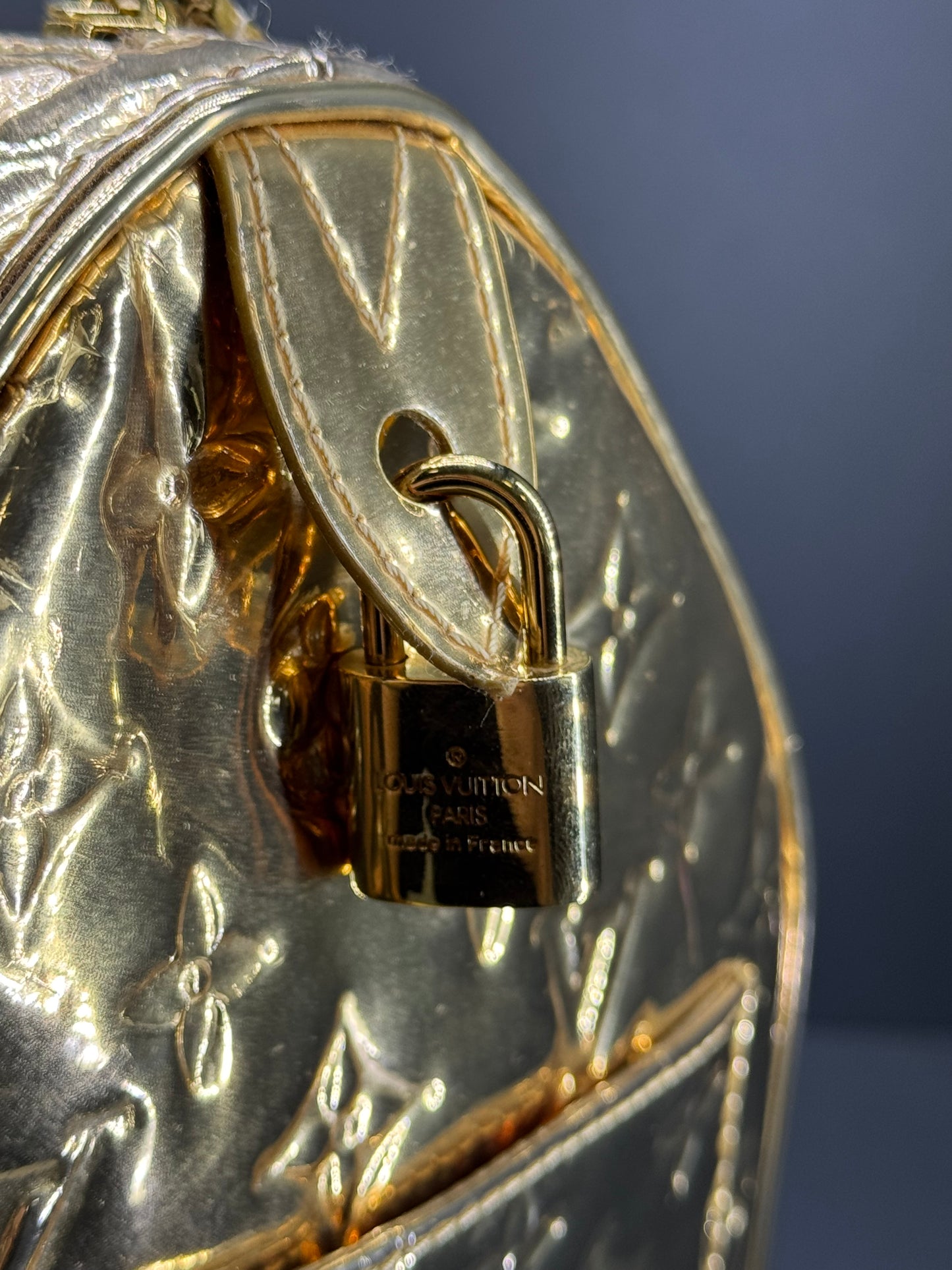 Louis Vuitton speedy 35 mirror gold