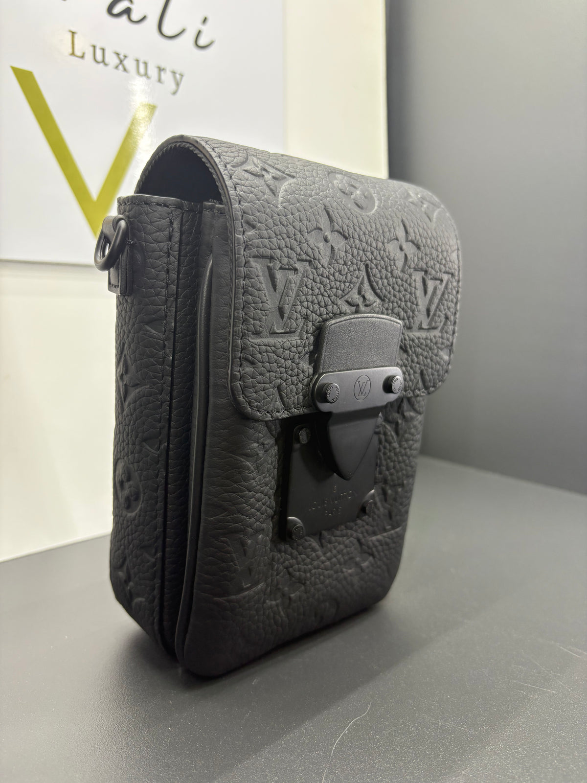 Louis Vuitton Lock Vertical Wearable Wallet